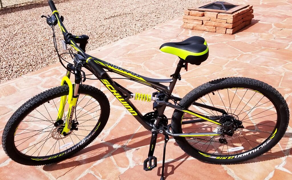 Schwinn Traxion Mountain Bike for Adult Men Women, 29-Inch Wheels, Full Suspension, 24-Speed Shimano Drivetrain, Trigger Shifter, 18-Inch Aluminum Frame, Mechanical Disc Brake, Matte Grey/Neon Green Customer Review Schwinn Traxion Mountain Bike for Adult Men Women, 29-Inch Wheels, Full Suspension, 24-Speed Shimano Drivetrain, Trigger Shifter, 18-Inch Aluminum Frame, Mechanical Disc Brake, Matte Grey/Neon Green - Customer Photo 1