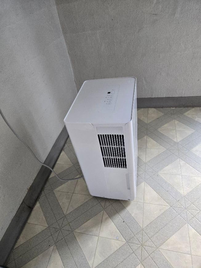 Amazon Basics Large Dehumidifier for Rooms, Energy Star Certified,Effectively Reduces Humidity, With Advanced Moisture Control, Timer, Auto-Defrost, Overflow Protection, up to 4000 SFT, 50 Pint, White - Customer Photo 4