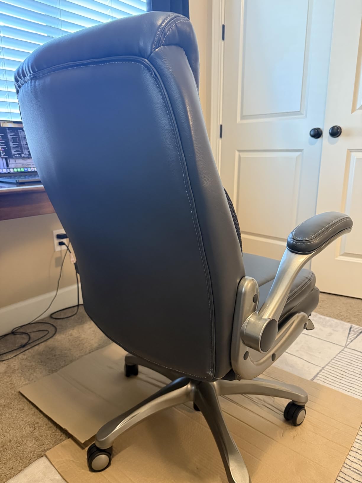 Amazon Basics Ergonomic Executive Office Desk Chair with Lumbar Support, Flip-up Armrests, Adjustable Height, Grey Leather - Customer Photo 1