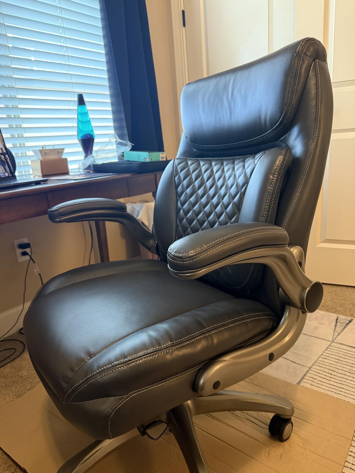 Amazon Basics Ergonomic Executive Office Desk Chair with Lumbar Support, Flip-up Armrests, Adjustable Height, Grey Leather - Customer Photo 2