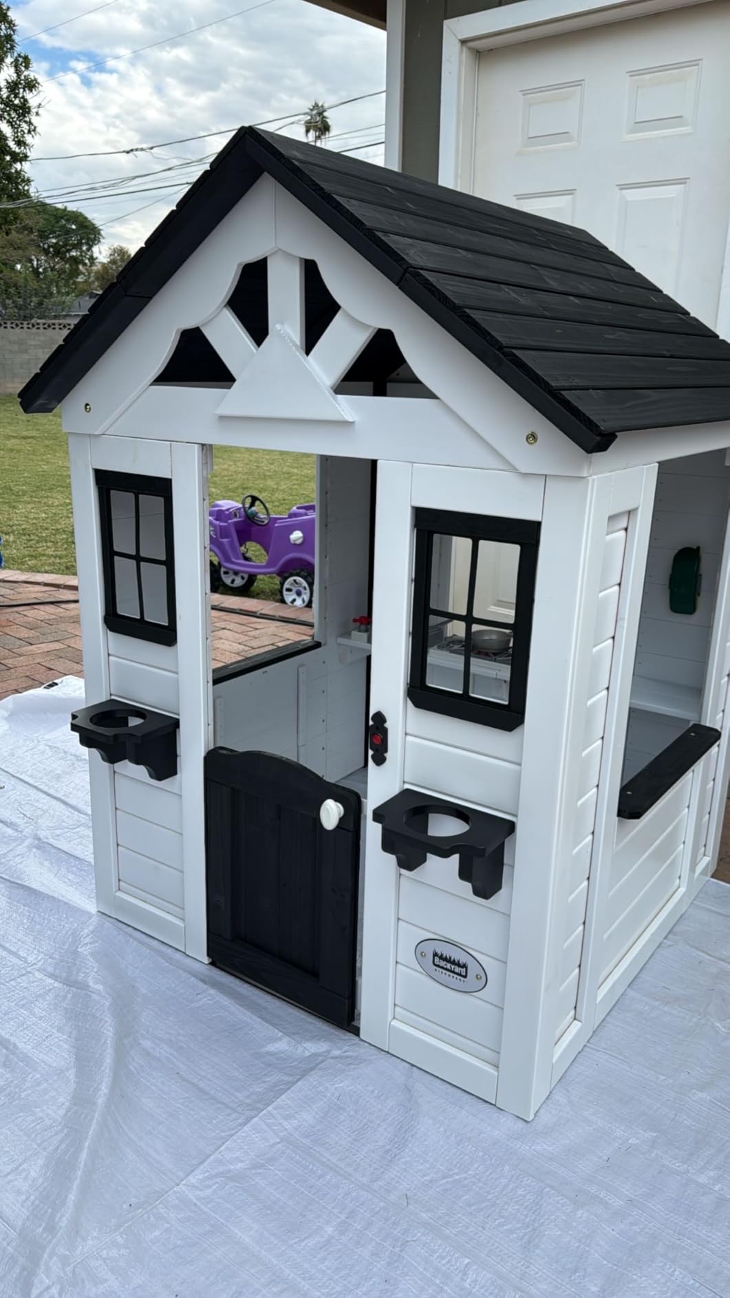 Backyard Discovery Sweetwater Cedar Wooden Kids Playhouse Cottage with Play Kitchen, Snack Bar, Half Door, Toy Phone, Windows, Flowerpot Holders, and Working Doorbell for Outdoor Imaginative Play - Customer Photo 2