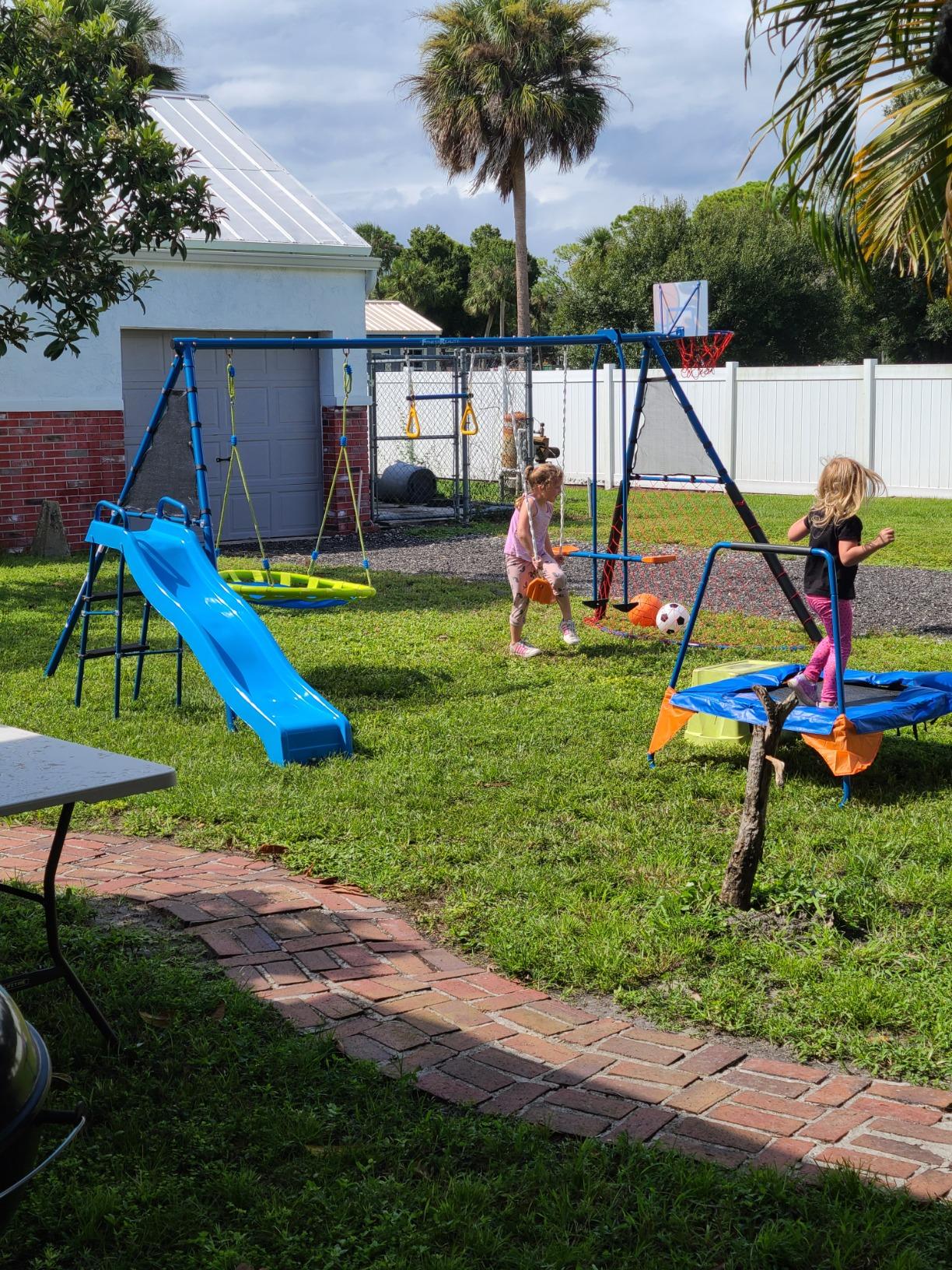 Sports Outdoor 8 Station Playground Set, Includes Swing Set, Slide, Monkey Bars, Basketball Hoop, Trampoline, Soccer and Basketball + Pump, Green - Customer Photo 1
