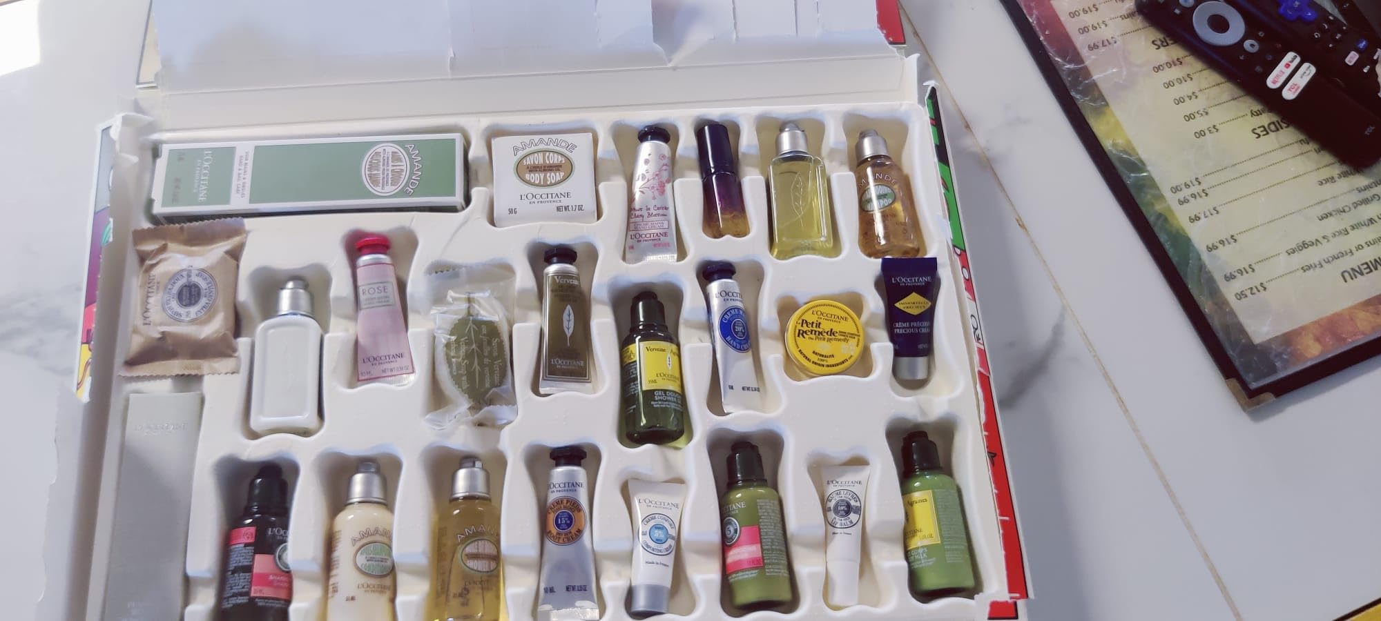 L'OCCITANE Advent Calendar, 24-Piece Luxury Beauty Countdown Holiday Gift Set Including Daily Skincare, Hair, Body & Fragrance, Travel Size Minis Customer Review L'OCCITANE Advent Calendar, 24-Piece Luxury Beauty Countdown Holiday Gift Set Including Daily Skincare, Hair, Body & Fragrance, Travel Size Minis - Customer Photo 1