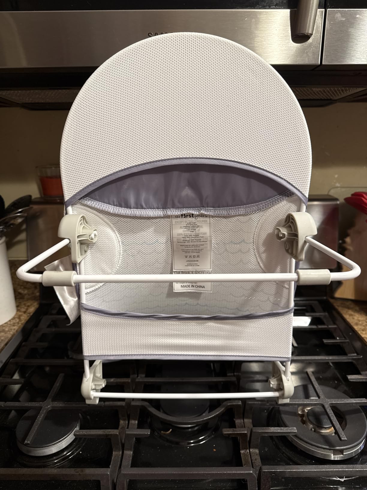 The First Years Sure Comfort Folding Baby Bather - Baby to Toddler Bath Tub - No-Slip Seat - for Sink or Tub Use - Customer Photo 1