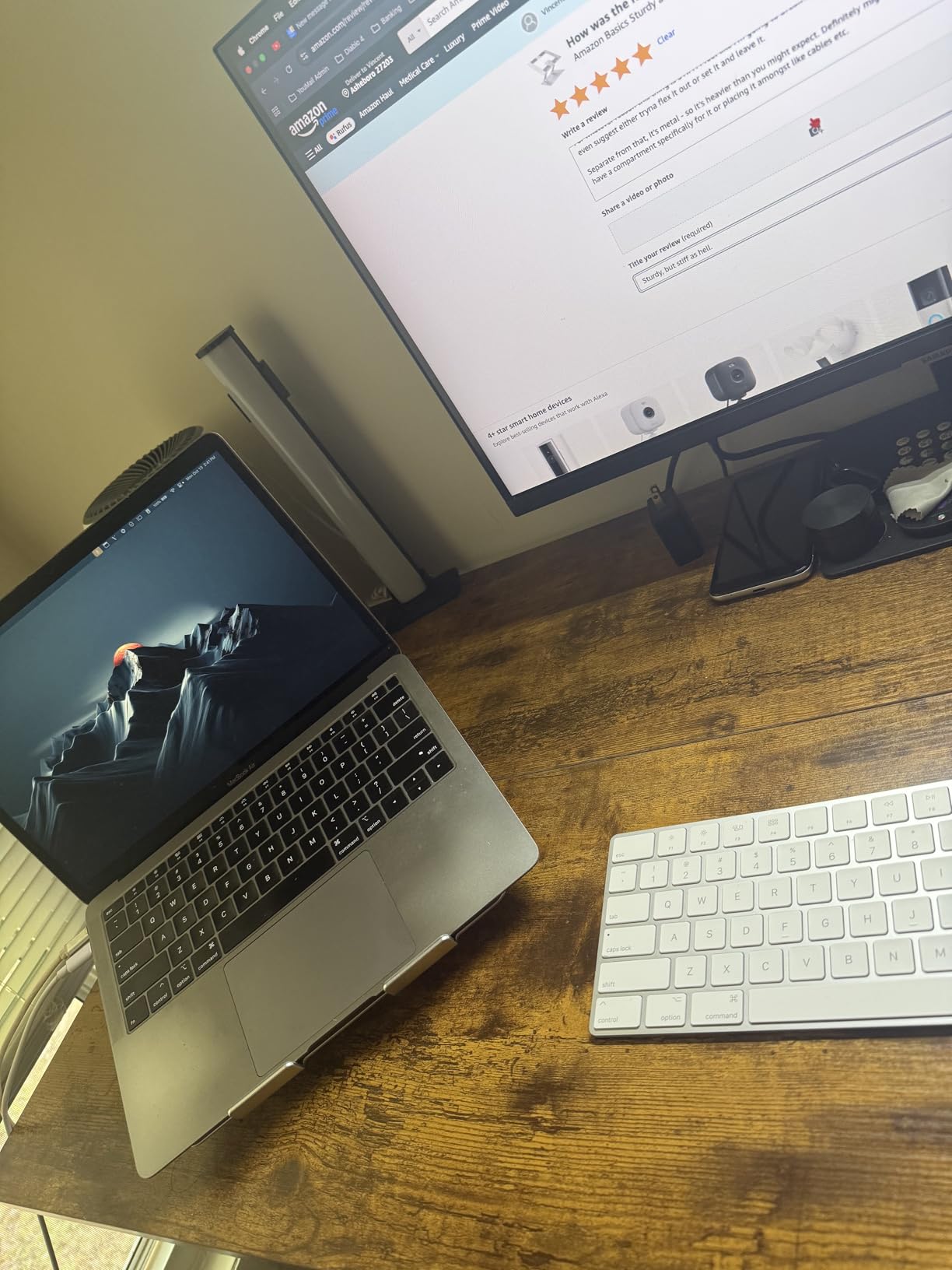 Amazon Basics Sturdy and Portable Ergonomic Laptop Stand for Desk, Adjustable Riser, Fits all Laptops and Notebooks up to 17.3 Inch, Silver, 10 x 8.7 x 6 in Customer Review Amazon Basics Sturdy and Portable Ergonomic Laptop Stand for Desk, Adjustable Riser, Fits all Laptops and Notebooks up to 17.3 Inch, Silver, 10 x 8.7 x 6 in - Customer Photo 2