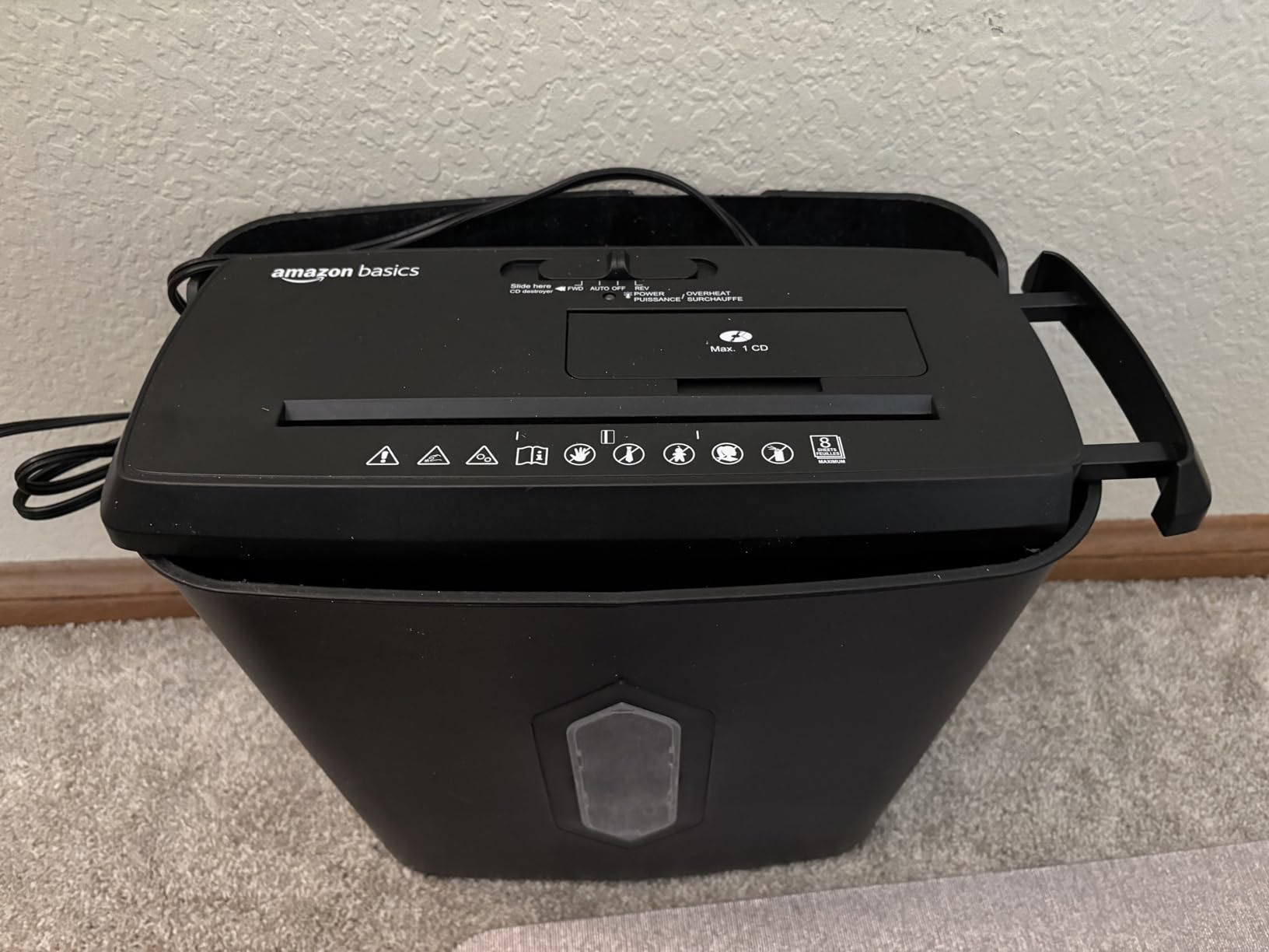 Amazon Basics 8-Sheet Strip Cut Paper, CD, and Credit Card Shredder with Auto-Off Compact, Portable Design, No Basket, Extendable Arm, Black - Customer Photo 1