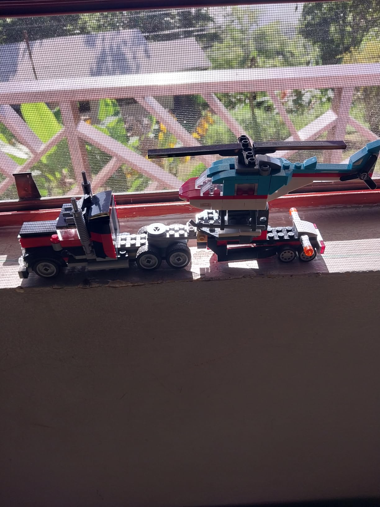 LEGO Creator 3 in 1 Flatbed Truck with Helicopter Toy, Transforms from Flatbed Truck Toy to Propeller Plane to Hot Rod and SUV Car Toys, Gift Idea for Boys and Girls Ages 7 Years Old and Up, 31146 - Customer Photo 2