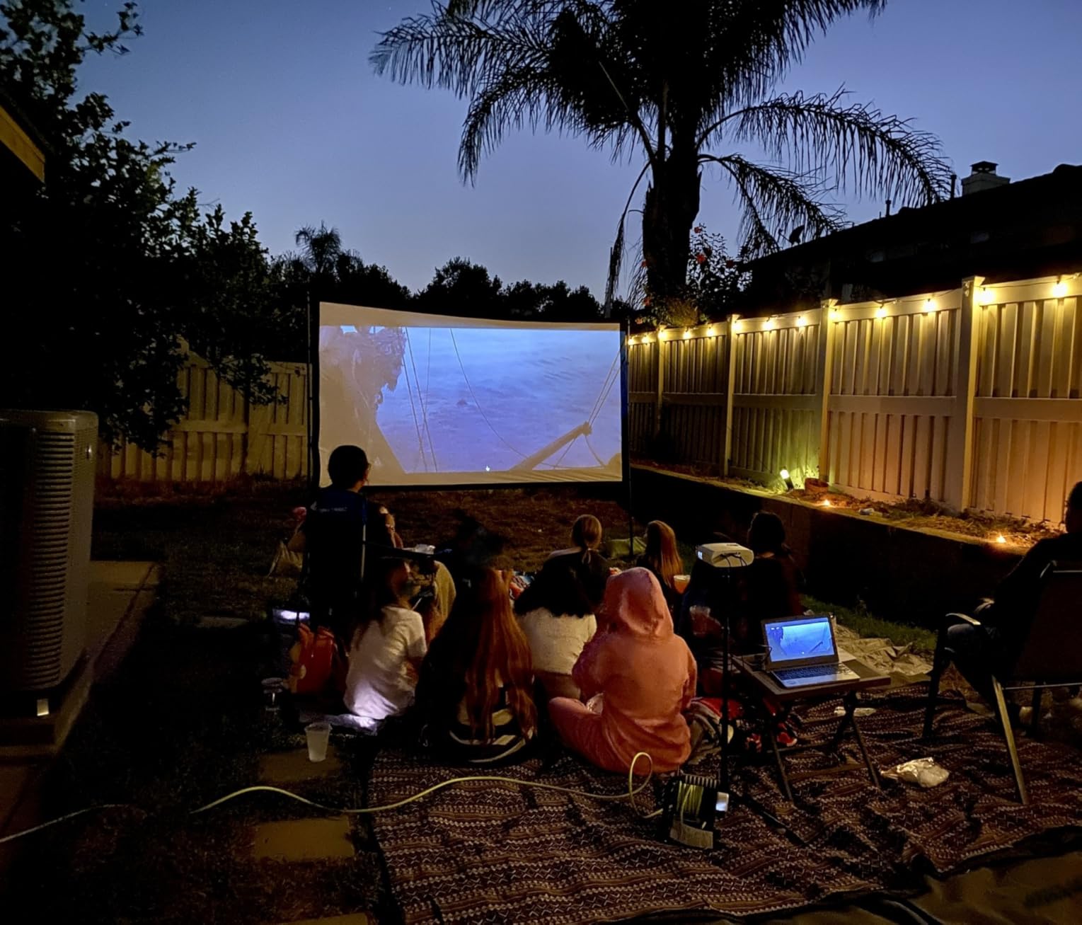 120 inch Projector Screen,2025 Upgraded- Black Backing Movies Screen,16:9 Foldable Anti-Crease Portable Projector Screens,Indoor Outdoor Washable for Home, Party, Office, Classroom - Customer Photo 1