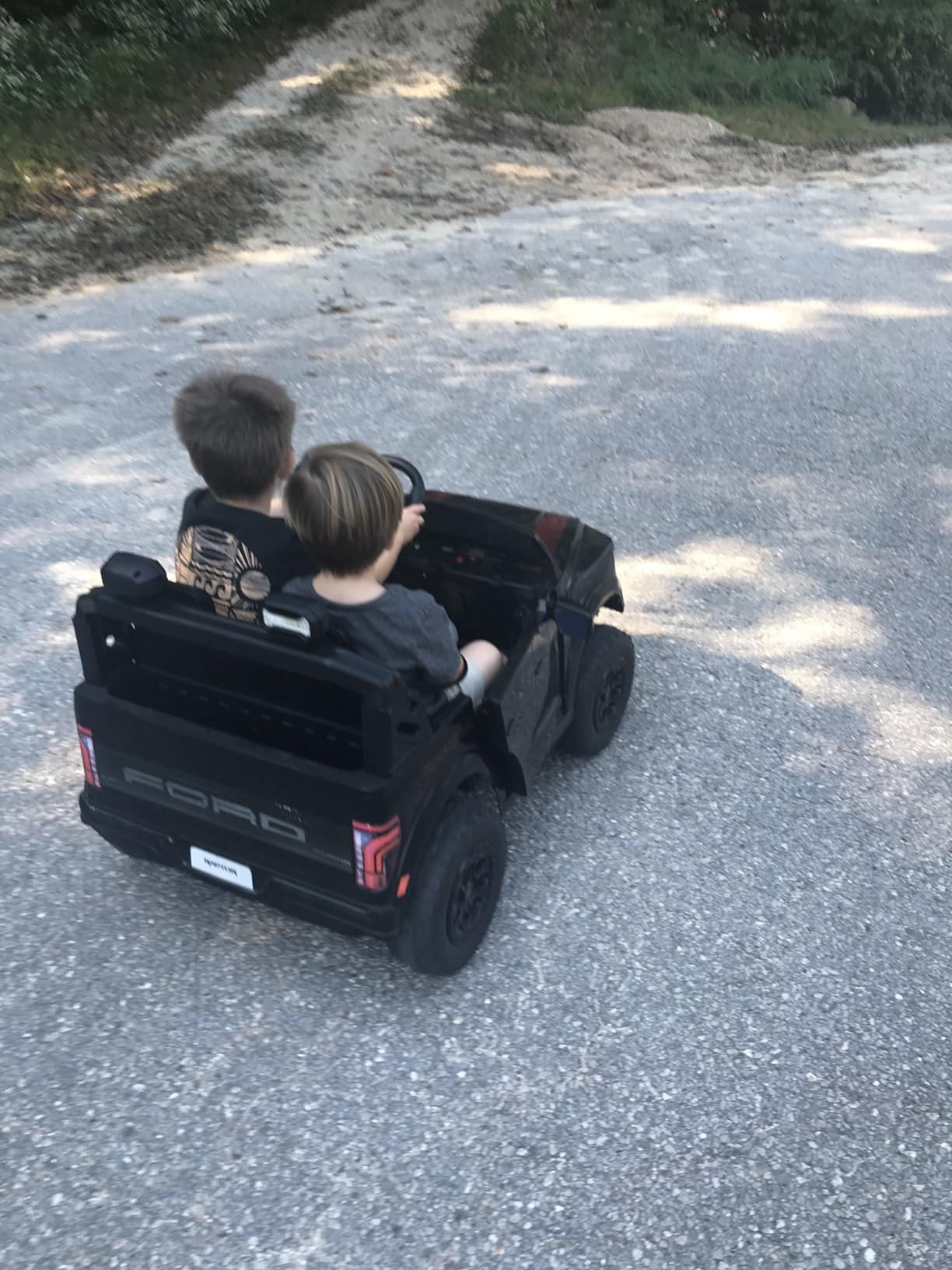 First Ride On 24V Kids Ride On Truck, Licensed Ford F-150 Raptor 2 Seater Electric Car w/Remote Control, Toddler Ride On Car Toys w/LED Lights, Bluetooth, Music, Truck Bed Storage, Soft Start (White) - Customer Photo 1