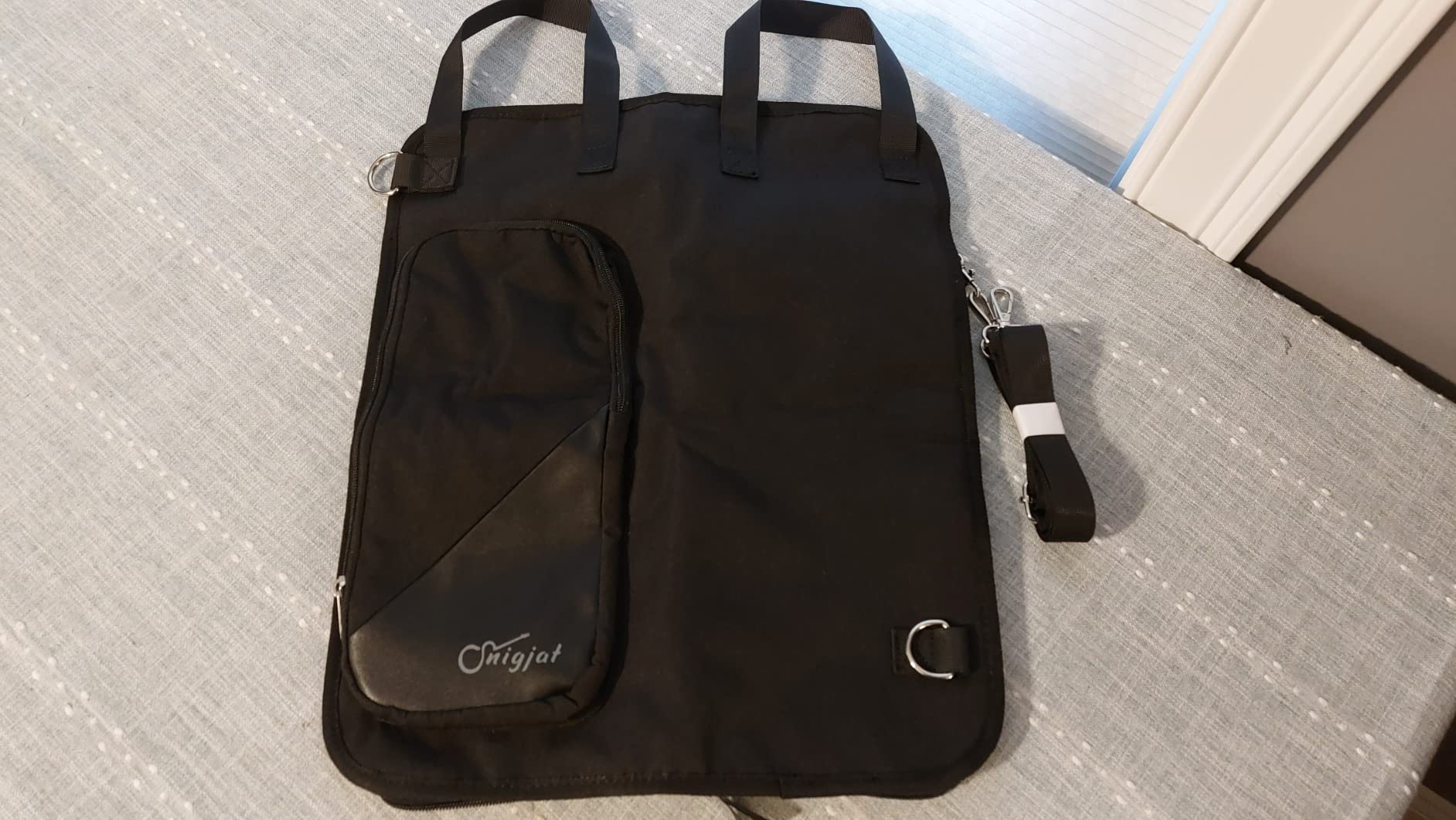 SNIGJAT Drumstick Bag with Crossbody Shoulder Strap, Drum Stick Bag with Large Capacity Anti-falling Pockets, Gifts for Drummers, Beginners in Band, Gig, Solid Drum Sticks Case w/Metal Hooks - Customer Photo 3