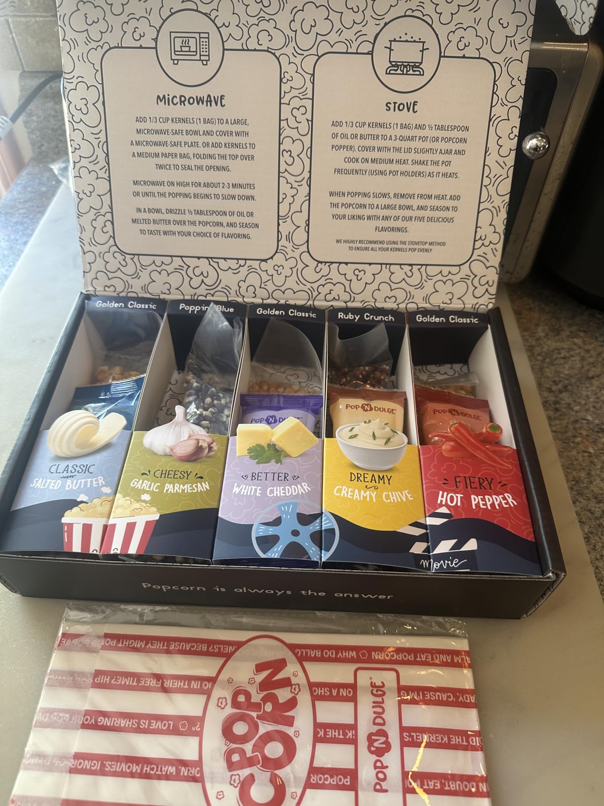 Pop n' Dulge Popcorn Movie Night Supplies 16 pcs Gift Set, 5 Gourmet Popcorn Kernels, 5 Seasoning Variety Packs Non-GMO Kosher Snacks, Great Housewarming Family Date Night Gifts Basket Ideas For Him Her Customer Review Pop n' Dulge Popcorn Movie Night Supplies 16 pcs Gift Set, 5 Gourmet Popcorn Kernels, 5 Seasoning Variety Packs Non-GMO Kosher Snacks, Great Housewarming Family Date Night Gifts Basket Ideas For Him Her - Customer Photo 1