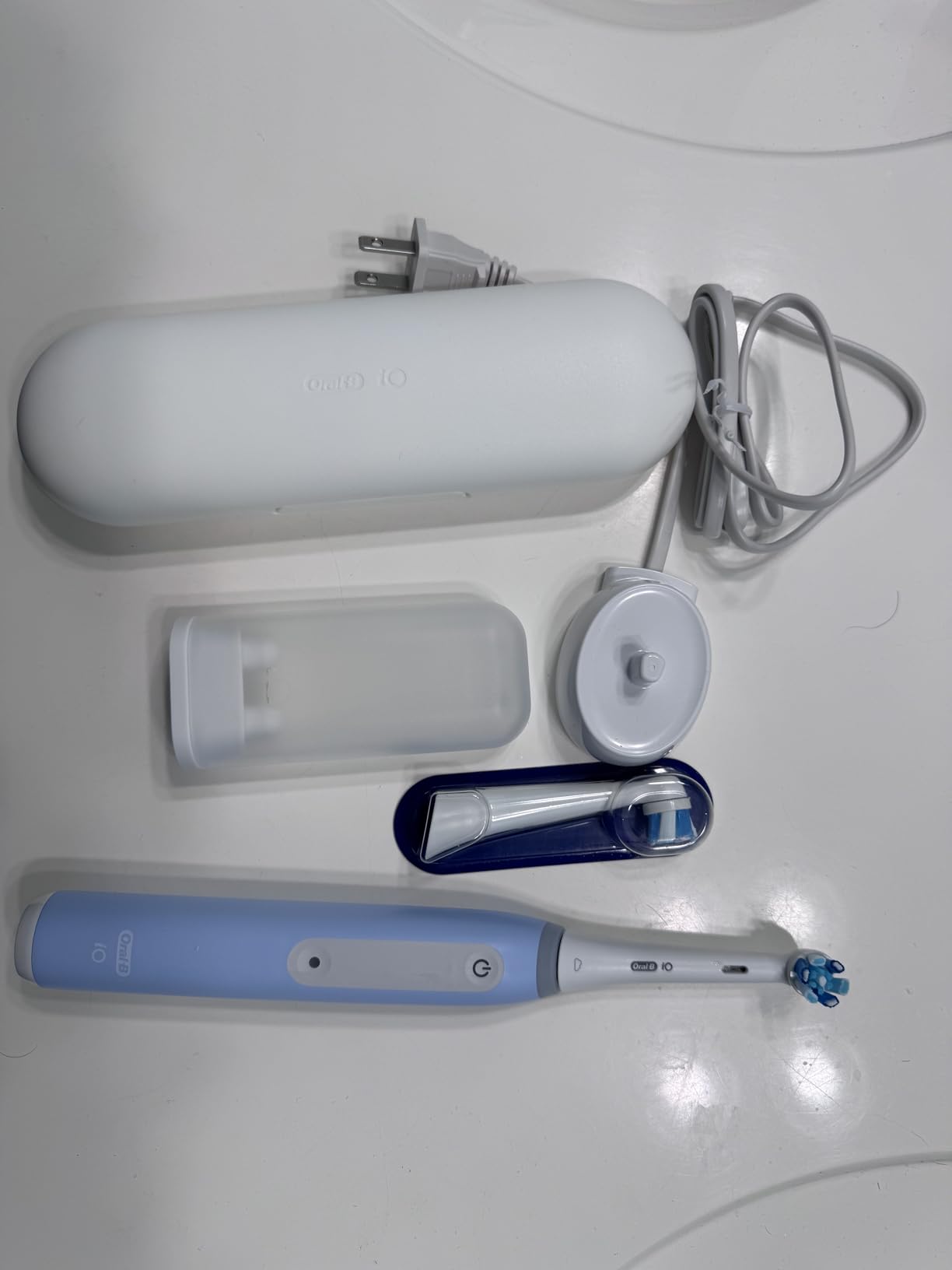 Oral-B iO Deep Clean Rechargeable Electric Powered Toothbrush, White with iO Series 3 Limited, 2 Brush Heads and Travel Case - Pressure Sensor to Protect Gums - 3 Cleaning Settings - 2 Minute Timer Customer Review Oral-B iO Deep Clean Rechargeable Electric Powered Toothbrush, White with iO Series 3 Limited, 2 Brush Heads and Travel Case - Pressure Sensor to Protect Gums - 3 Cleaning Settings - 2 Minute Timer - Customer Photo 2