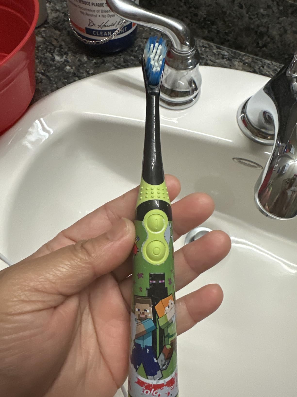 Colgate Kids Battery Powered Minecraft Toothbrush, Extra Soft Kids Battery Toothbrush with 1 AA Battery Included, Made for Ages 3 and Up, Features Easy On and Off Switch, Flat Lay Handle, 1 Count - Customer Photo 4