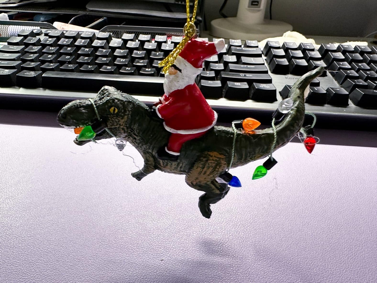 Santa Claus Riding a T Rex Dinosauer Wrapped in Lights Christmas Ornament for Kids - Customer Photo 2