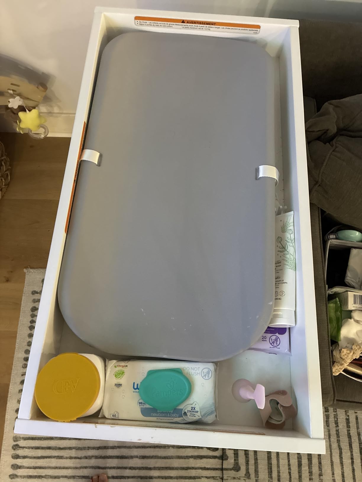 Graco Teddi Changing Table with Water-Resistant Changing Pad, Driftwood | GREENGUARD Gold Certified, Includes Bonus Water-Resistant Changing Pad with Safety Strap, 2 Shelves, Easy-to-Match customer photo 2