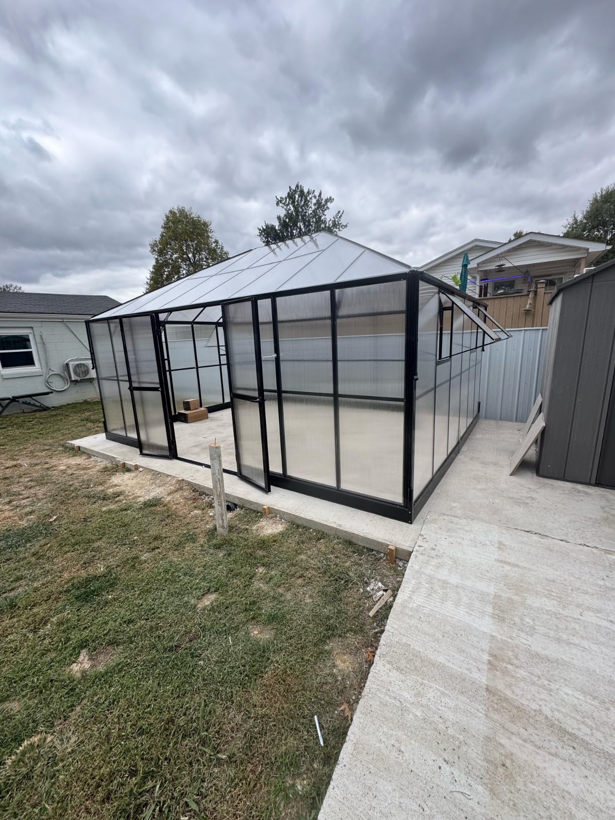 Jocisland 16x12x9.5 FT Outdoor Polycarbonate Greenhouse, 6 FT Wall Height | Aluminum Greenhouses with 4 Ventilation and Rain Gutter, Double Doors with Hook, Walk-in Greenhouse for Backyard Garden customer photo 1